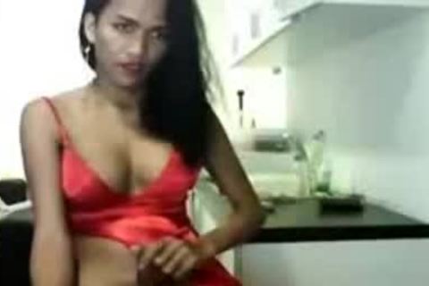 kinky Asain tranny In Red dress Cums